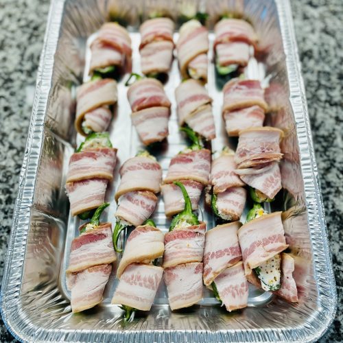 Bacon wrapped jalapeno poppers before smoking