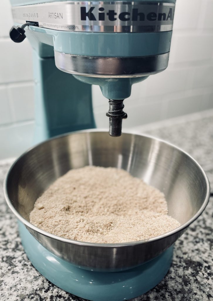 Almond flour muffin mixture in mixer bowl