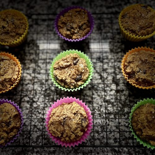 Pumpkin Spice Muffins in Tins on Cooling Rack