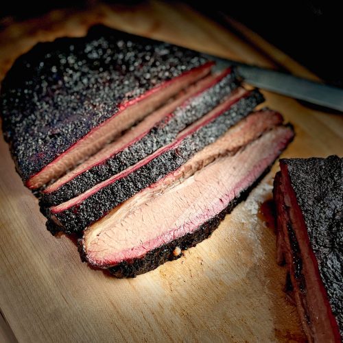 Sliced brisket on cutting board