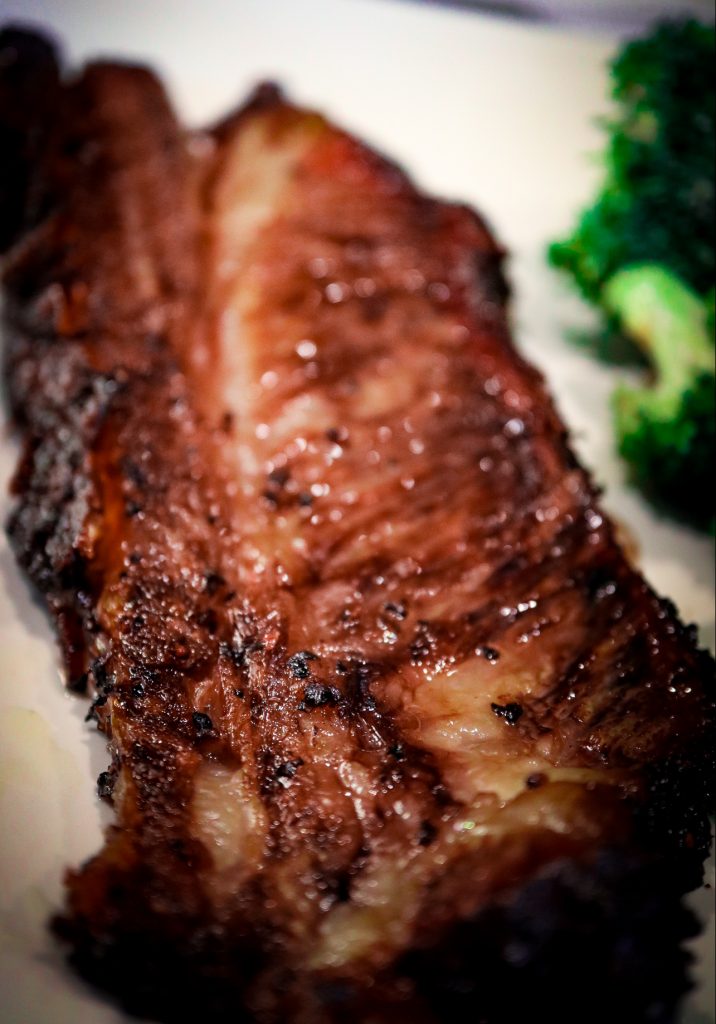 Smoked Beef Ribs on Plate with Broccoli