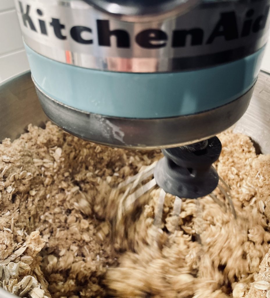 Ingredients for Paleo Chocolate Chip Oatmeal Cookies being mixed in stand mixer