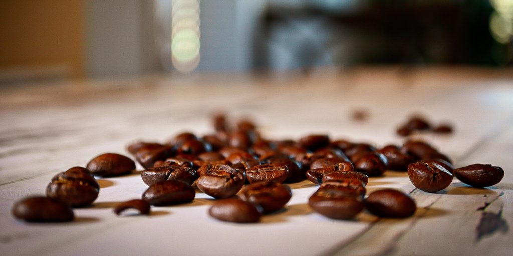 Scattered pile of roasted coffee beans