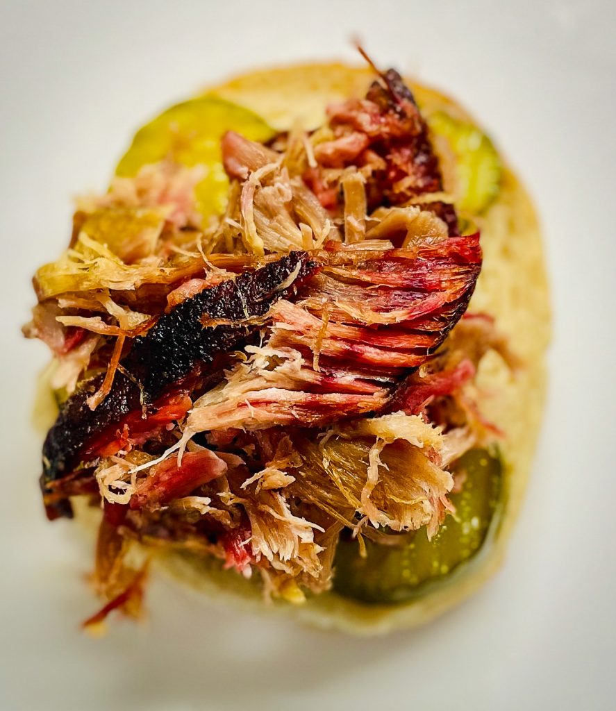 Smoked Pulled Pork on Bun with Pickles