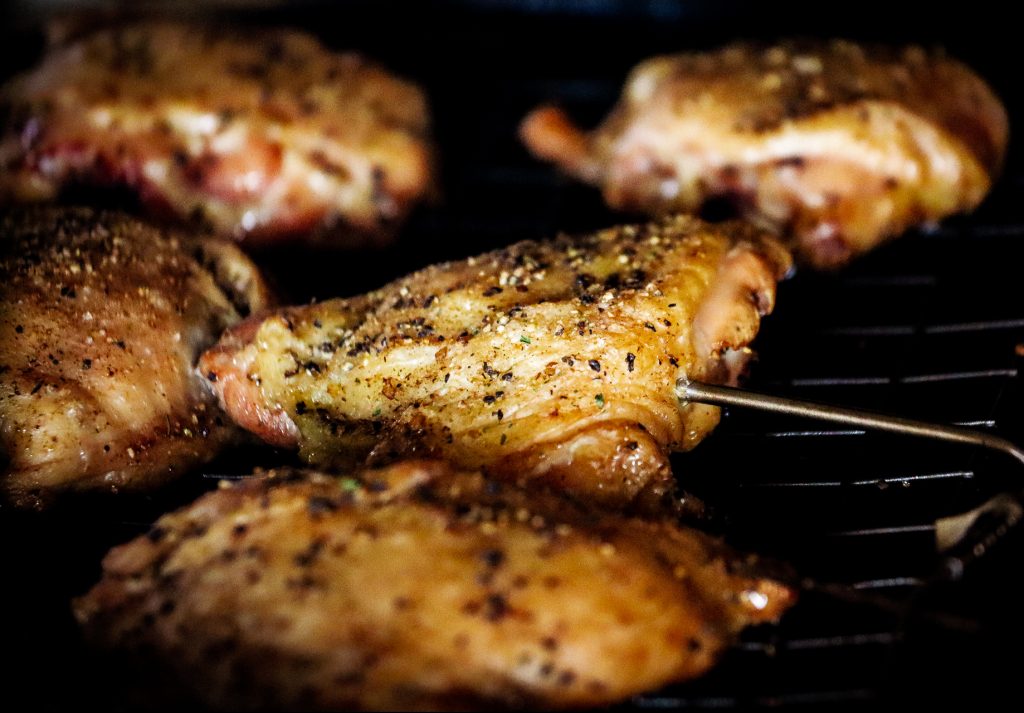 Smoked Chicken Thighs on grill with temp probe