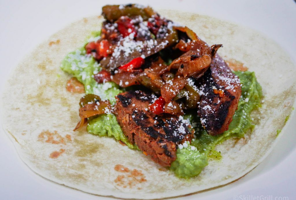 Steak Fajitas on plate on Tortilla