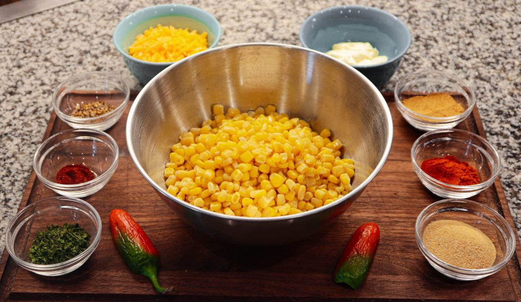 Smoked Street Corn ingredients on wooden cutting board