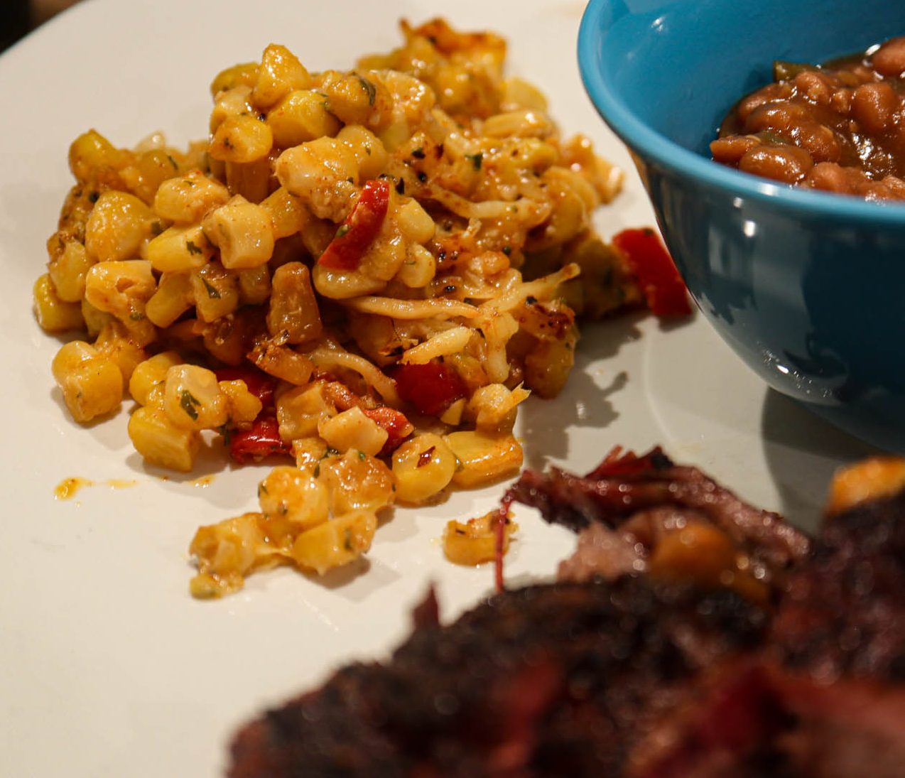 Smoked Street Corn on plate with sides