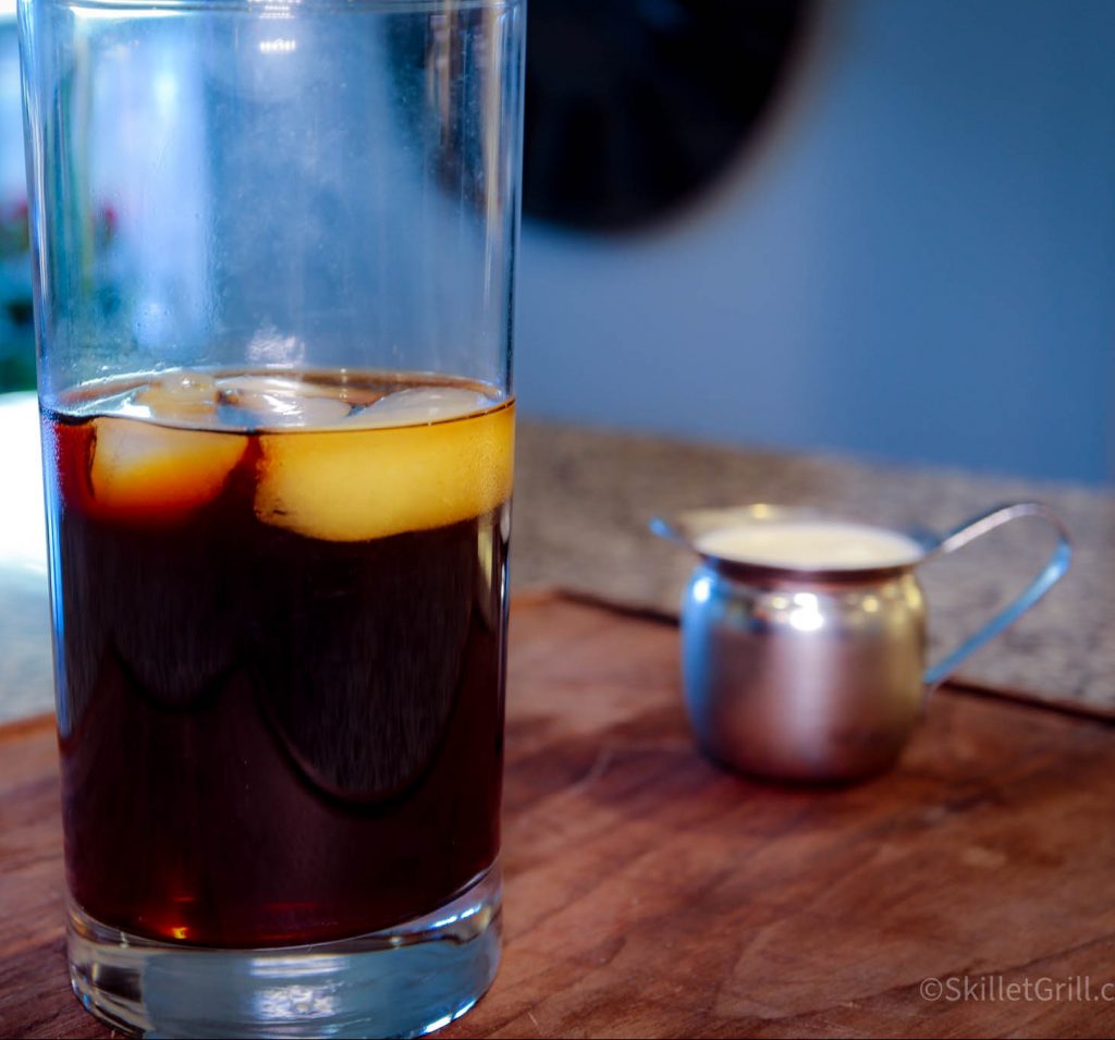 Smoked Cold Brew in glass with cream