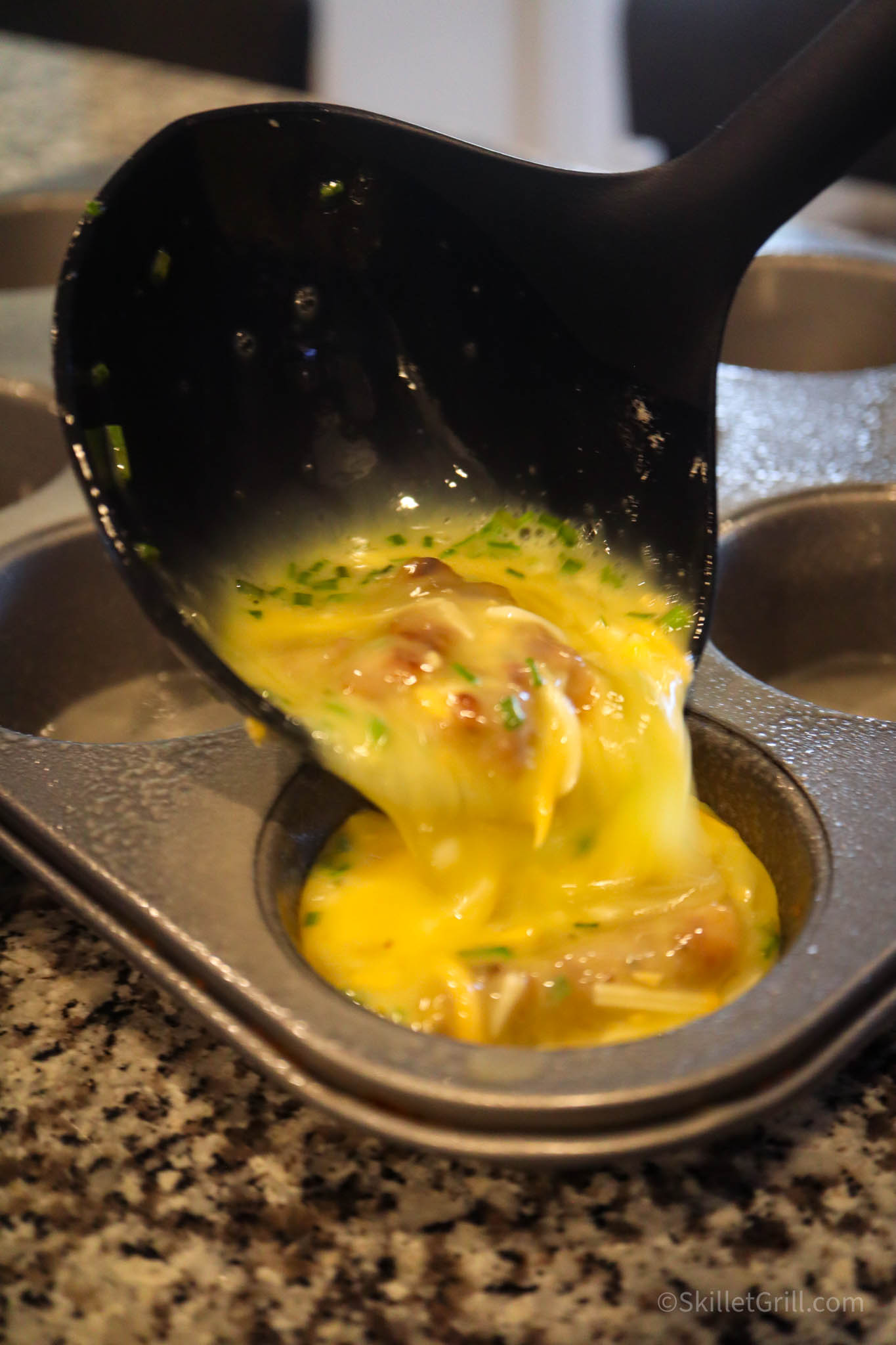 Keto Egg Bite mixture being poured into tray